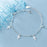 Color: Bracelet - Pearl cross hand ornament